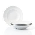 A set of four large white porcelain pasta bowls stacked in a pyramid shape with a plain white plate on top.