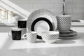 Waterside 16pc Geo Noir Porcelain Dinnerware Set (video attached)