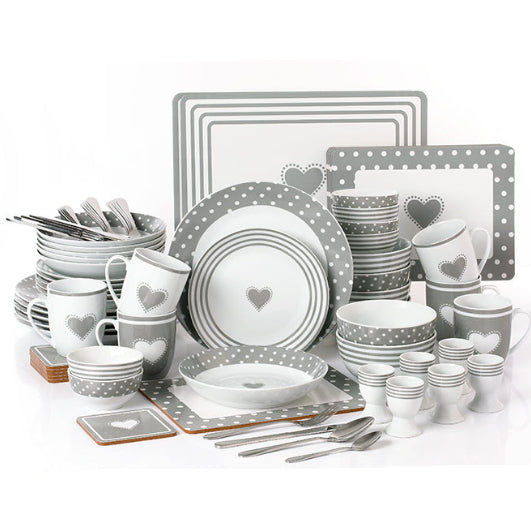Gray and white ceramic dinnerware set with heart designs on a white background
