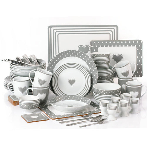 Gray and white ceramic dinnerware set with heart designs on a white background