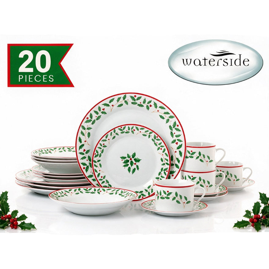 Waterside 20-piece Christmas dinnerware set featuring white plates, bowls, cups, and saucers decorated with a green holly leaf pattern and red borders, shown on a white background with decorative holly sprigs.