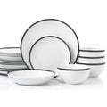 Set of white dinnerware with black rim on a white background