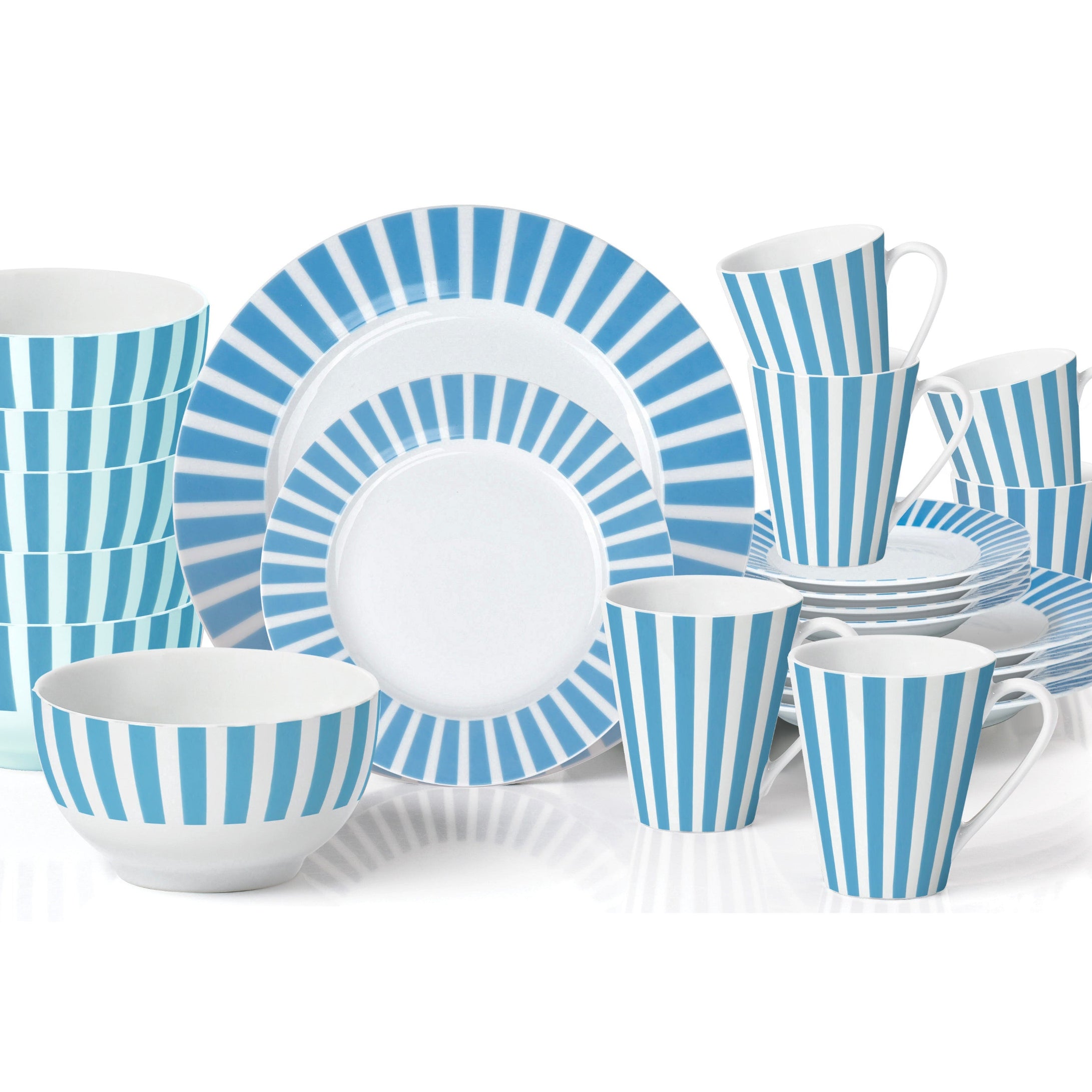 Set of blue and white striped ceramic dinnerware on a white background