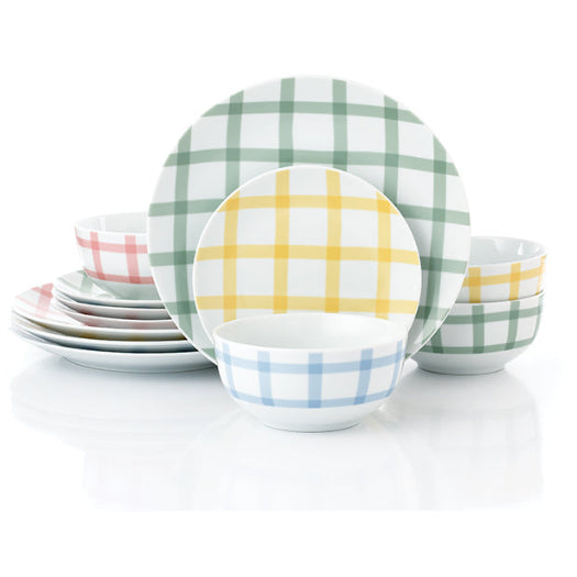Set of ceramic plates with plaid patterns on a white background