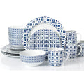 Ceramic dinnerware set with blue geometric pattern on a white background