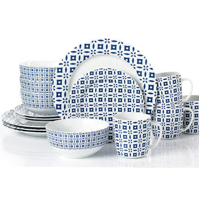 Ceramic dinnerware set with blue geometric pattern on a white background