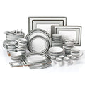 Dinnerware set with plates, bowls, and cutlery on a white background