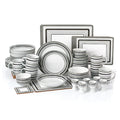 Set of gray and white ceramic dinnerware on a white background