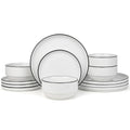 Set of white dinnerware with black stripes on a white background