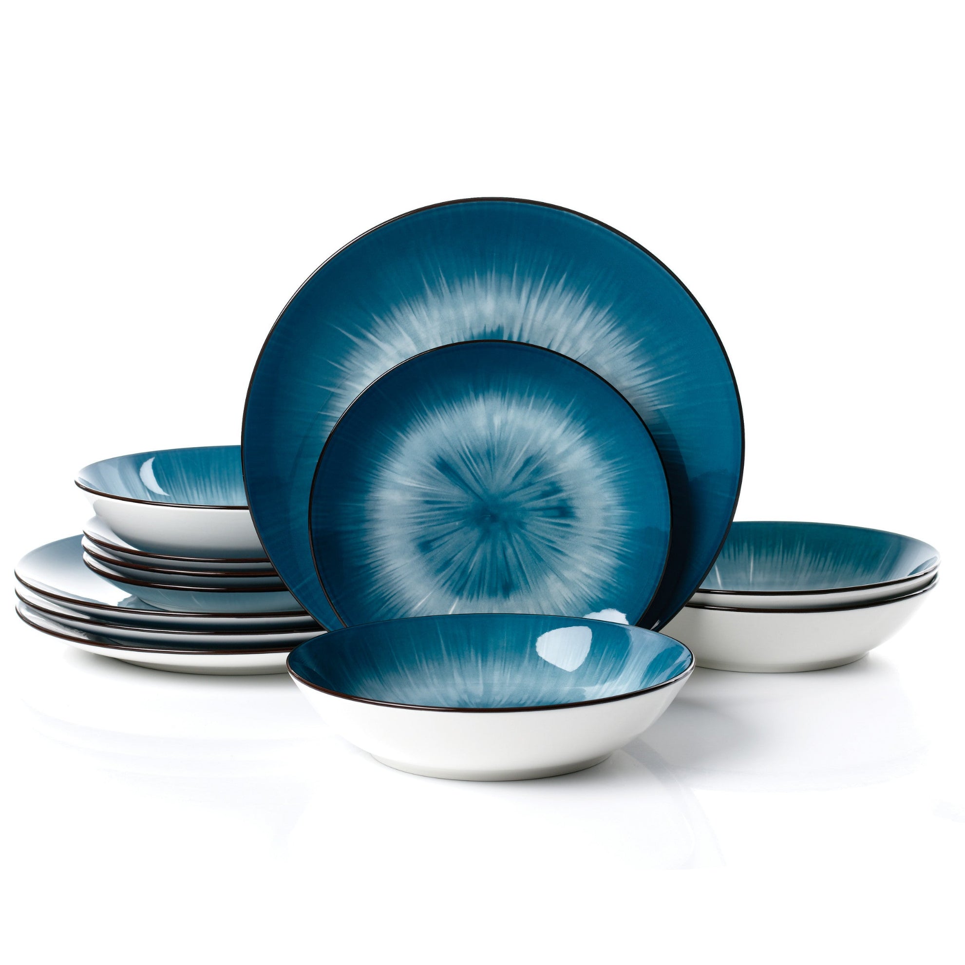 Set of blue ceramic dinnerware with a white background
