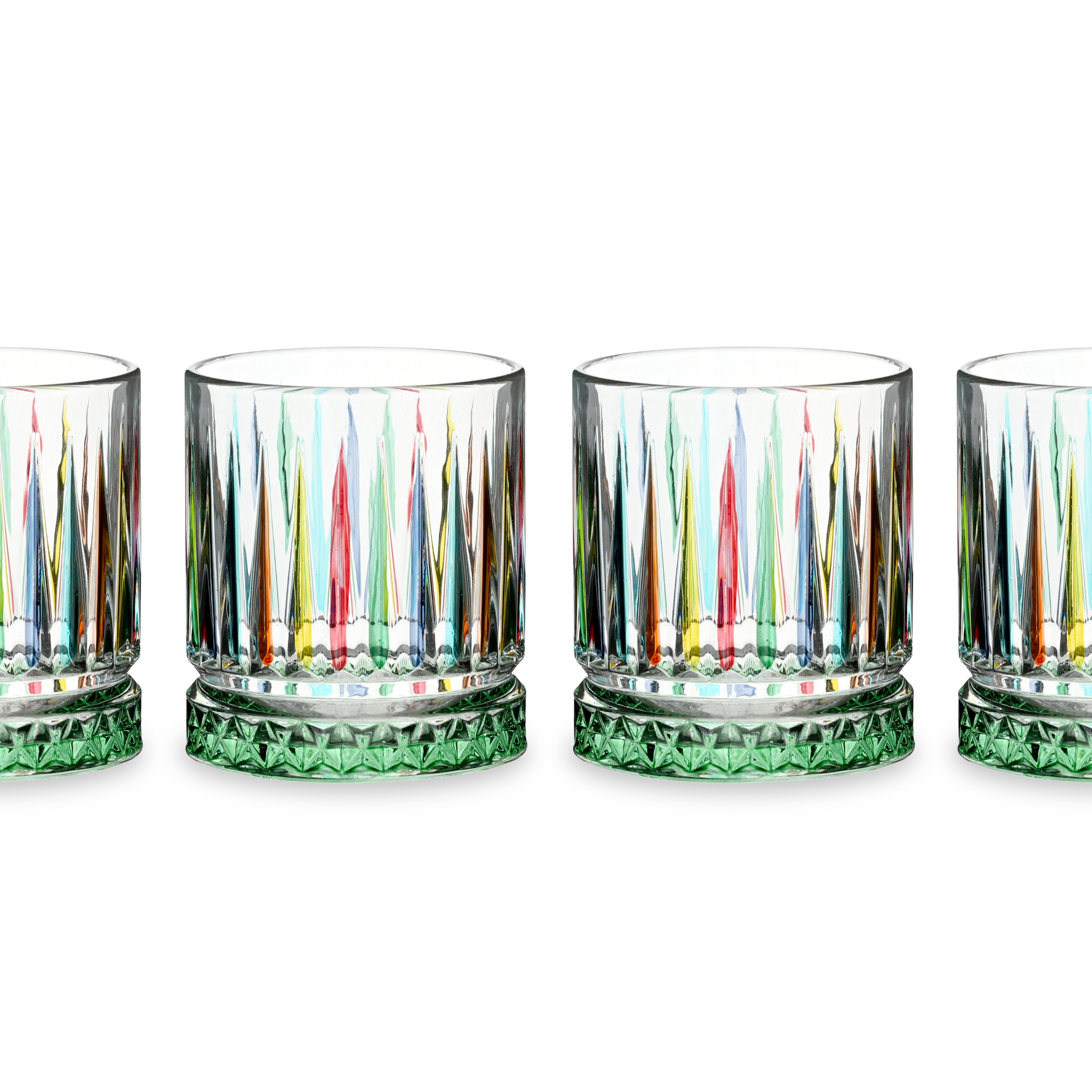 Set of four colorful glass tumblers with green bases on a white background