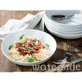 Pasta dish with tomato sauce and basil leaves in a white bowl on a wooden table, with 'waterside' branding.